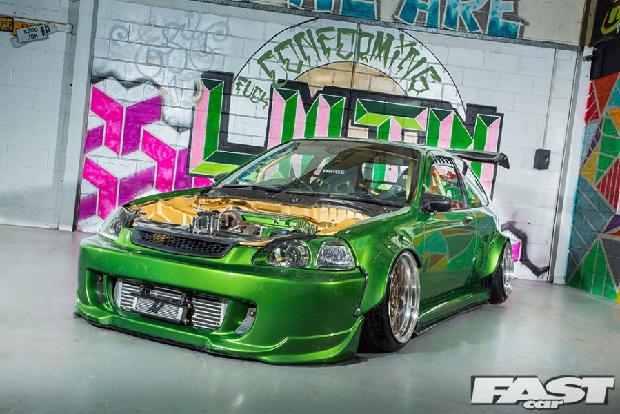 An EK Civic with stanced suspension.