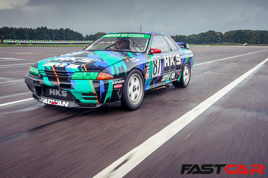 Front 3/4 driving shot of HKS Nissan Skyline GT-R R32