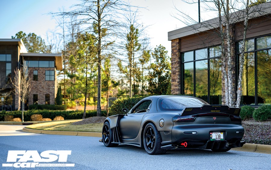 A modified Mazda RX-7 FD, stopped on the street.