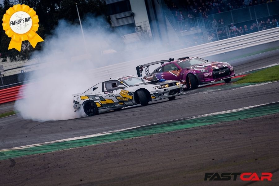 cars drifitng on track at Silverstone